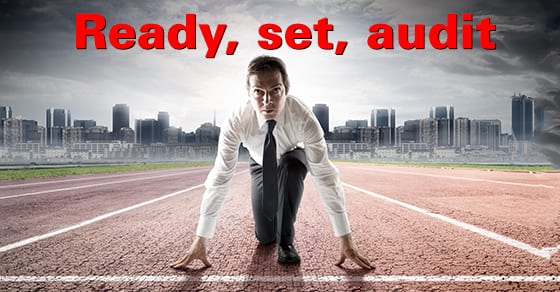 Man in starting stance on track field