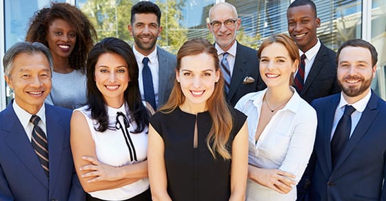 Employees smiling at camera