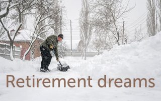 person shoveling snow during snowstorm