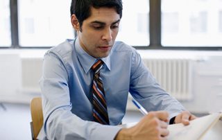 male attorney going over inheritance papers